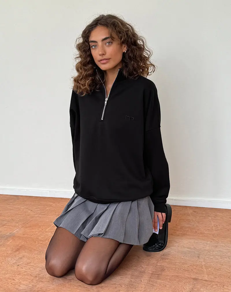 Tirma High Neck Jumper In Tonal Black With M Embroidery 1